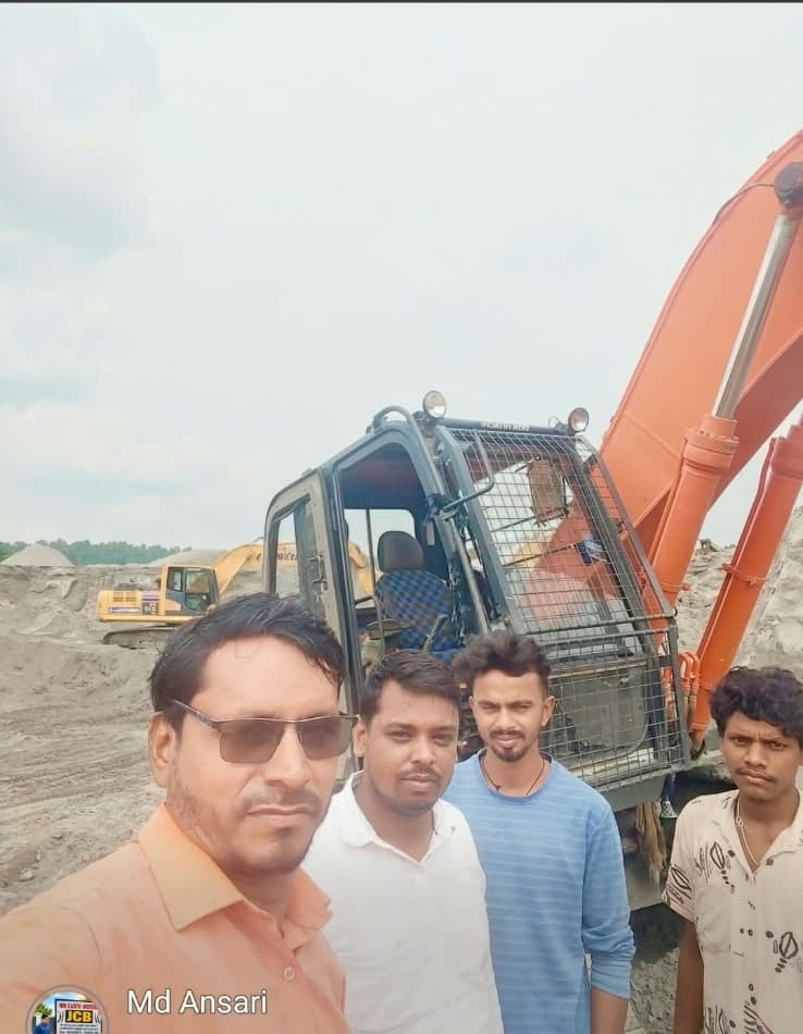 Poclain excavator at power plant earth-moving site